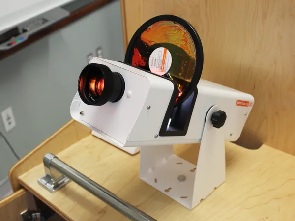 A projector with a coloured effects wheel mounted on the Snoezelen cart